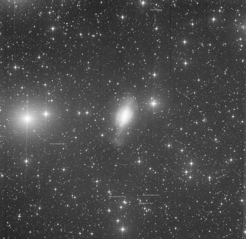 Asteroids near NGC 3521